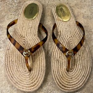 MK Michael Kors espadrille flip flops with rubber tortoise print upper.Size 7